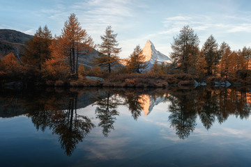 Incredible colorful sunset on Grindjisee lake with Matterhorn Cervino peak in Swiss Alps. Zermatt resort location, Switzerland. Landscape photography