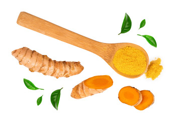 Turmeric powder and turmeric root isolated on white background. Top view. Flat lay
