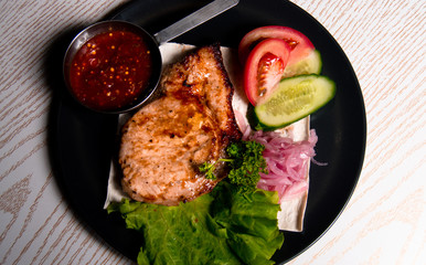 meat chicken dish on a plate for the menu