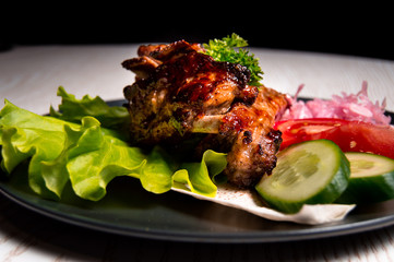 meat chicken dish on a plate for the menu