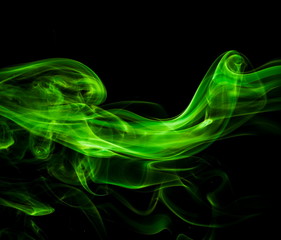 Green smoke on black background