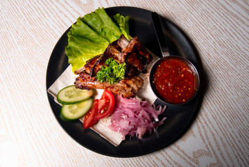 meat chicken dish on a plate for the menu