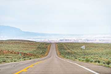 Road highway with nobody and horizon landscape view near Capitol Reef National Monument and Goblin Valley State Park in Utah in summer day