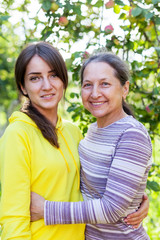 Obraz premium elderly woman with adult daughter