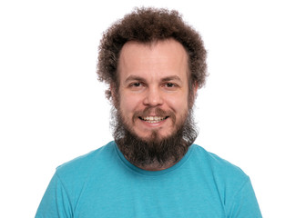 Happy crazy bearded Man with funny Curly Hair, isolated on white background. Looking at camera and smiling. Emotions and signs concept.