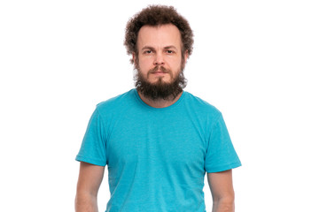 Crazy bearded Man with funny Curly Hair, isolated on white background. Looking at camera. Emotions and signs concept.