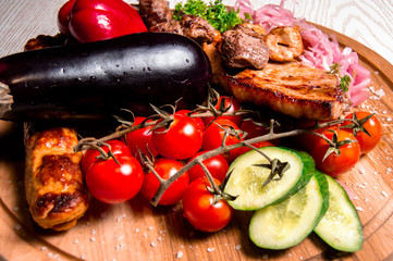 meat plate with vegetables and herbs