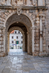 View on stone facades and arches in historic fortified Korcula town, Korcula Island, Dalmatia, Croatia