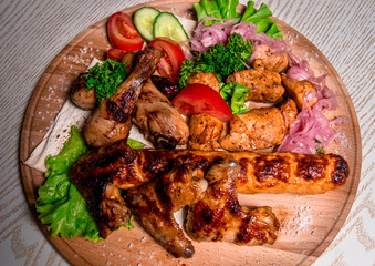 set of chicken meat with vegetables