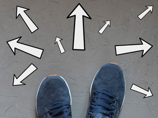 human feet and road signs