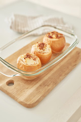 baked apples with cottage cheese and plums, preparing healthy food for family and children