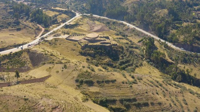 Aeria view around the archaeological site of Puca Pucara are military ruins. The fort is made of large walls, terraces and staircases.
