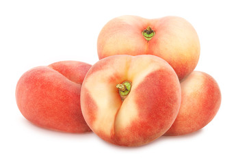 Heap of whole flat peaches isolated on white background. As design element.