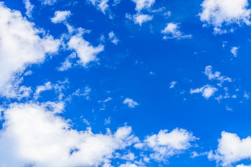 White fluffy clouds in the blue sky