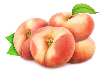 Heap of freshly picked flat peaches with leaves isolated on white background. As design element.