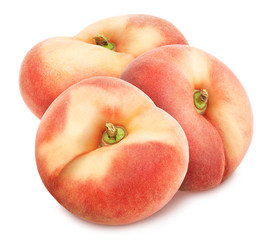 Composition with juicy flat peaches isolated on white background.