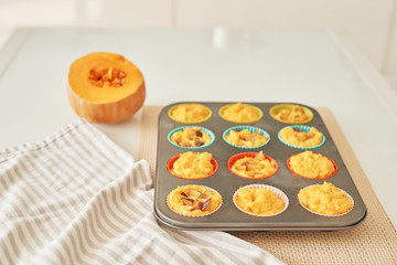 Thanksgiving, pumpkin muffins for Halloween, cooking at home in the kitchen