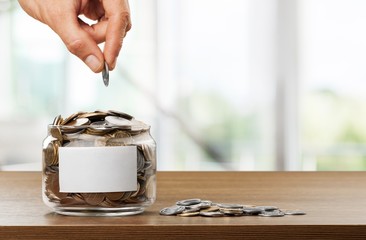 Coins and alarm clock.