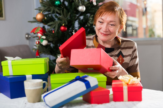 Happy Elderly Woman With Christmas Box Gift Holiday Concept Stock
