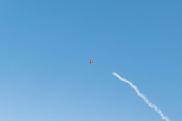 Small plane performs aerobatics in the sky