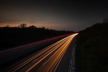 Fototapeta na wymiar Traffic light trails highway at night