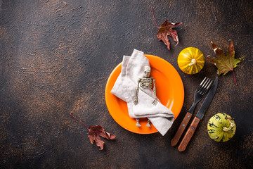 Halloween table setting with pumpkin