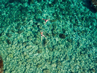Swimming in clear sea of the remote island of Palagruža in Croatian Adriatic