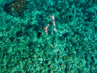 Swimming in clear sea of the remote island of Palagruža in Croatian Adriatic