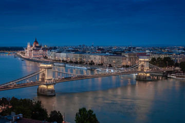 Fototapeta na wymiar Budapest, Hungary - Aerial skyline view of Budapest with the famous illuminated Szechenyi Chain Bridge and Hungarian Parliament building at dusk
