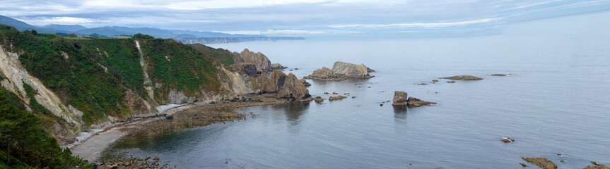 Fototapeta na wymiar Panoramic of cliff and beach of Asturias, Spain
