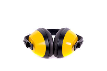 Yellow ear-muffs isolated on a white background. Earplugs. The concept of hygiene and safety at work, home. Too loud sound, hearing damage.
