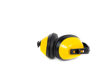 Yellow ear-muffs isolated on a white background. Earplugs. The concept of hygiene and safety at work, home. Too loud sound, hearing damage.