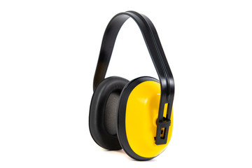Yellow ear-muffs isolated on a white background. Earplugs. The concept of hygiene and safety at work, home. Too loud sound, hearing damage.