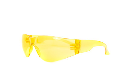 Yellow safety goggles for eyes isolated on white background. The concept of hygiene and safety at work, home. Eye safety, eye protection against damage.