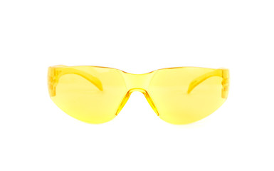 Yellow safety goggles for eyes isolated on white background. The concept of hygiene and safety at work, home. Eye safety, eye protection against damage.