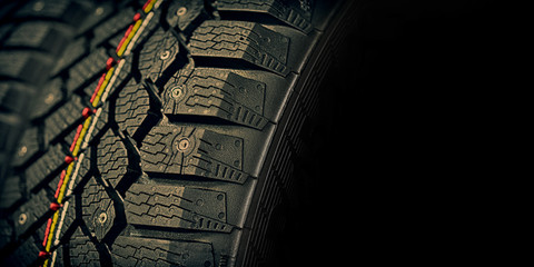 tire car macro on a dark background, wheels