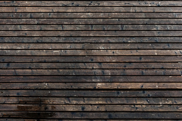 Wall of old wooden plank boards. Wooden material texture surface