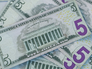 Fototapeta na wymiar American currency background. Dollars of United States of America. US Dollars background