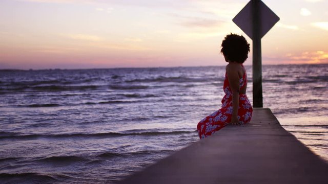 Beautiful young woman on the beach