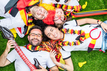 Happy german soccer fans celebrate championship victory