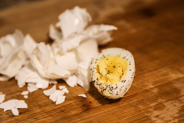 Fototapeta na wymiar Hard boiled eggs on a chopping board