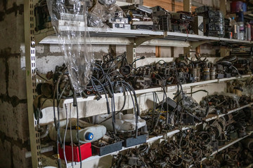 Used spare parts, disassembly. Old car parts suitable for future use. Different old spare parts from cars. Sale of old spare parts from the car