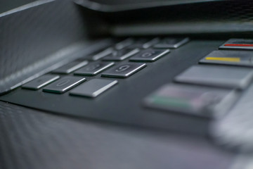 Close-up of ATM buttons at night