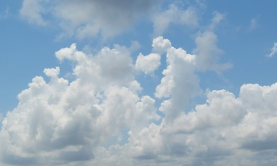 Beautiful cloudscape on blue sky background 