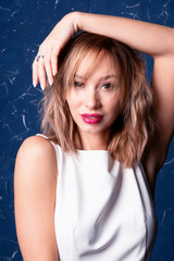 Sexual emotional attractive woman in a luxurious interior..