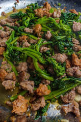 Cooking Sausage Broccolini