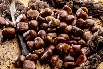 Roasted chestnuts served on an old table