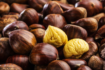 Roasted chestnuts served on an old table