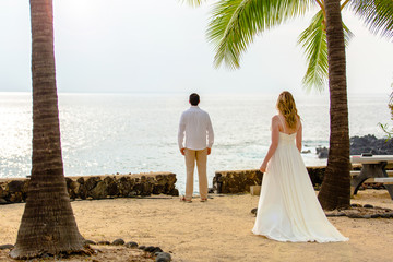 bride and groom on beach