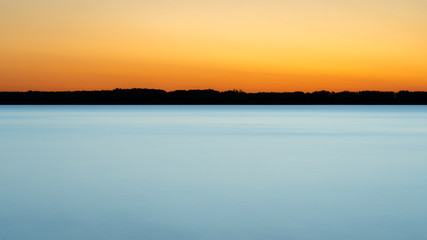 Naklejka premium Sunrise over the St. Lawrence River